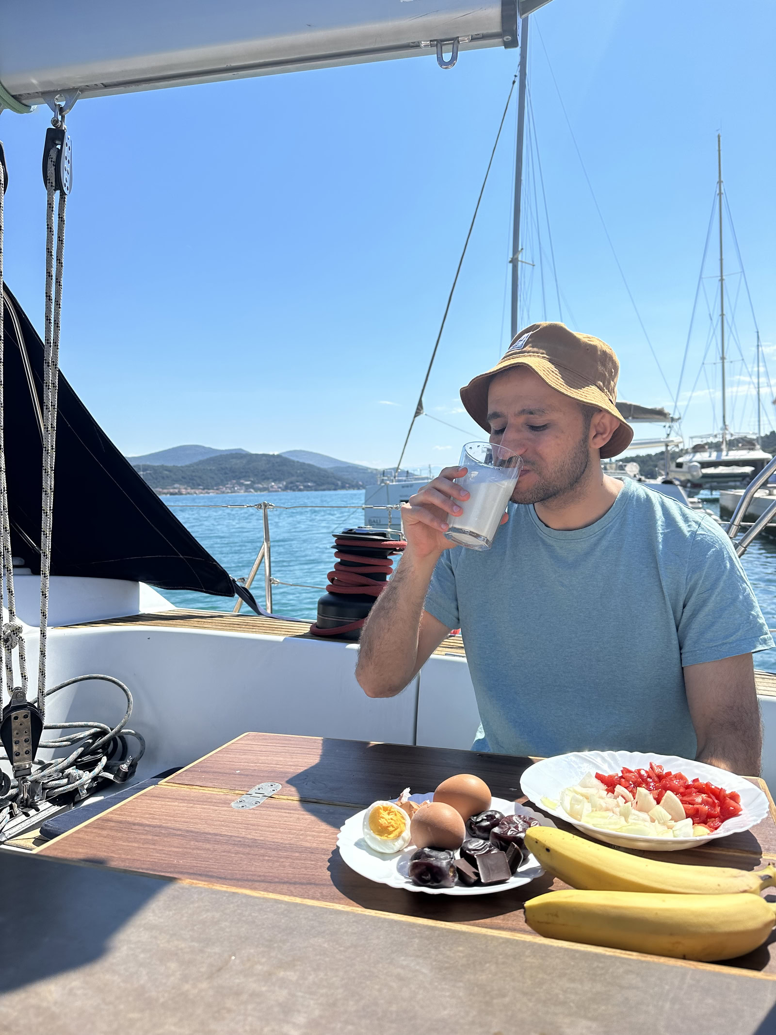 Me eating my first breakfast at the boat -- looks like someone who despise the milk, but it is not